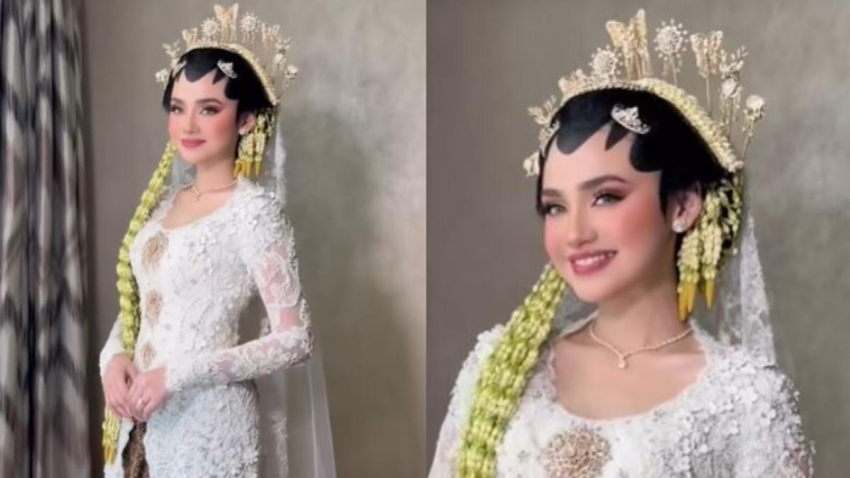 PERNIKAHAN EL SYIFA - Syifa Hadju mengusung tema pengantin Solo putri untuk momen akad nikah. Ia tampil memesona berkebaya putih.