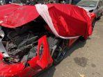 Kondisi-mobil-Ferrari-merah-yang-dikemudikan-RAS-29-pasca-menabrak-beberapa-pengendara-motor.jpg