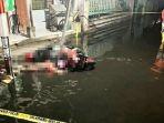 Pasutri-meninggal-diduga-tersengat-listrik-saat-mengendarai-sepeda-motor-menerjang-banjir.jpg