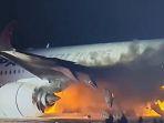 Pesawat-Japan-Airlines-terbakar-di-Bandara-Tokyo-pada-Selasa-212024-2.jpg