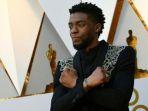 aktor-chadwick-boseman-berpose-saat-tiba-di-karpet-merah-academy-awards-ke-90.jpg
