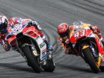 andrea-dovizioso-dan-marc-marquez_20171029_165112.jpg
