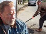 arnold-schwarzenegger-inisiatif-mengaspal-jalan-rusak.jpg