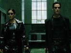 carrie-anne-moss-dan-keanu-reeves-dalam-film-the-matrix.jpg