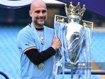 manajer-manchester-city-pep-guardiola-berpose-dengan-trofi-liga-premier.jpg