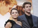 miley-cyrus-dan-liam-hemsworth_20170528_123739.jpg