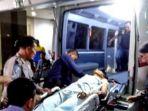 pelaku-bom-bunuh-diri-ra-22-dimasukkan-ke-dalam-ambulance.jpg