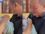 pria-ini-menangis-akhirnya-bisa-menggendong-anak-setelah-21-tahun-menanti.jpg