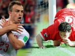 selebrasi-gol-xherdan-shaqiri-dan-robbie-fowler_20180624_170222.jpg