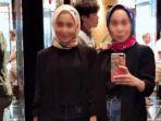 si-kembar-rihana-rihani-yang-diduga-menjadi-pelaku-penipuan-po-iphone.jpg