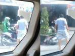 tangkap-layar-driver-ojol-dianiaya-pria-berpakaian-kaus-abu-abu.jpg