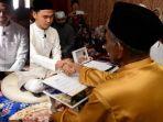 viral-wali-nikah-salah-sebut-nama-pengantin-pria-dengan-nama-besan-saat-akad-nikah-semua-ngakak.jpg