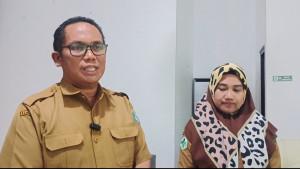 Kepala-Dinas-Kesehatan-Kabupaten-Pasangkayu-Rukman-didampingi-staf.jpg