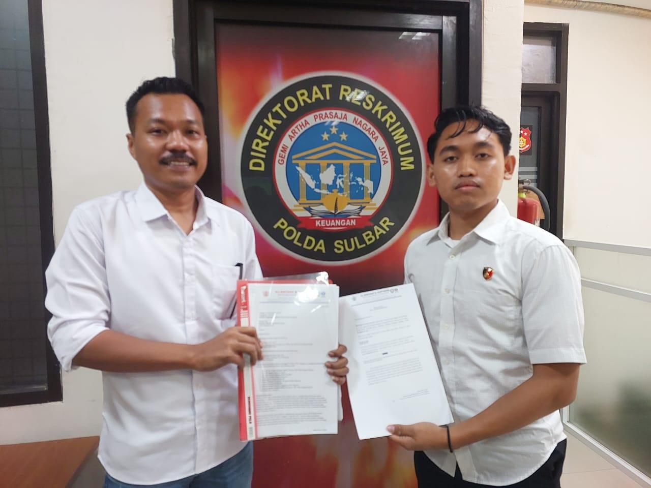 Kuasa-hukum-pelapor-Hasri-melaporkan-mantan-Wakil-Bupati-Polman-dan-Majene-ke-Polda-Sulbar.jpg