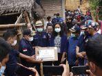 Cristina-menerima-bantuan-uang-tunai-dan-laptop-dari-Nasdem-Sulbar.jpg