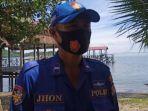 Kanit-Satuan-Polisi-Perairan-dan-Udara-Polairud-Aipda-Jhon-Mangadi-di-Pantai-Sappoang-Kec.jpg