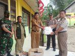 Karantina-Pertanian-Mamuju-menyerahkan-APD-dan-disnfektan-kepada-Wakil-Bupati-Mamasa.jpg