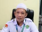 Kepala-Tim-Kepenghuluan-Kanwil-Kemenag-Sulbar-Hj-Syamsumarlin-saat-diwawancarai.jpg