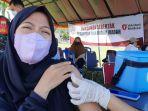 Pelajar-mengikuti-vaksinasi-di-lapangan-merdeka-Mamuju.jpg