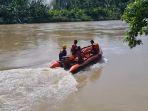Pencarian-bocah-14-tahun-tenggelam-di-Sungai-Mapilli-Kabupaten-Polman-Kamis-2332023.jpg