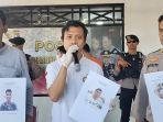 Polisi-saat-memperlihatkan-daftar-tiga-DP.jpg