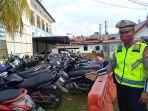 Puluhan-kendaraan-sepeda-motor-diamankan-di-Ditlantas-Polda-Sulbar.jpg