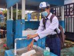 Siswa-SMPN-1-Mamuju-cuci-tangan-Senin-1392021.jpg