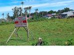 Spanduk-Penolakan-Pembangunan-Jalan-Arteri-Tahap-II-Mamuju.jpg