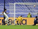 Striker-Real-Madrid-asal-Karim-Benzema-kiri-berselebrasi-setelah-mencetak-gol.jpg