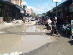 Tergenang-air-kondisi-ruas-jalan-pasar-Topoyo-Mamuju-Tengah-Mateng-Sulbar.jpg