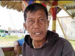Umar-salah-satu-tukang-ojek-saat-ditemui-di-pangkalan-ojeknya.jpg