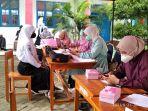 Vaksinasi-Covid-19-pelajar-di-SMK-YPP-Wonomulyo-Polman.jpg