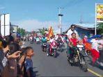 Warga-Desa-Pambusuang-konvoi-menyambut-Euro-2024.jpg