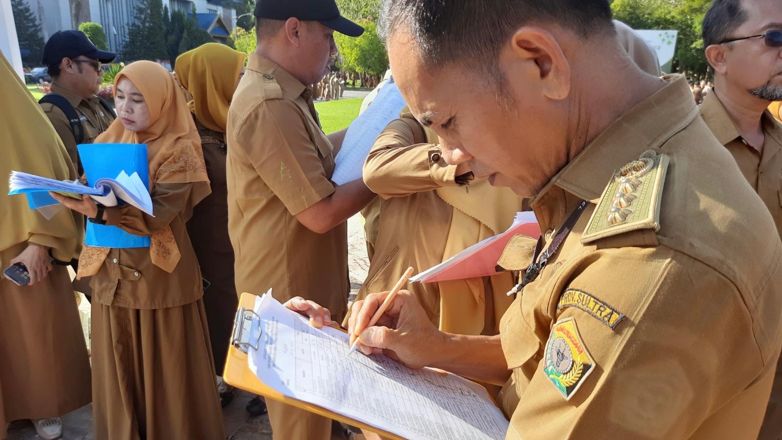 Apel-Perdana-Usai-Libur-Lebaran-Idulfitri-2025-Gubernur-Sultra-Cek-Kehadiran-ASN-di-Lapangan.jpg