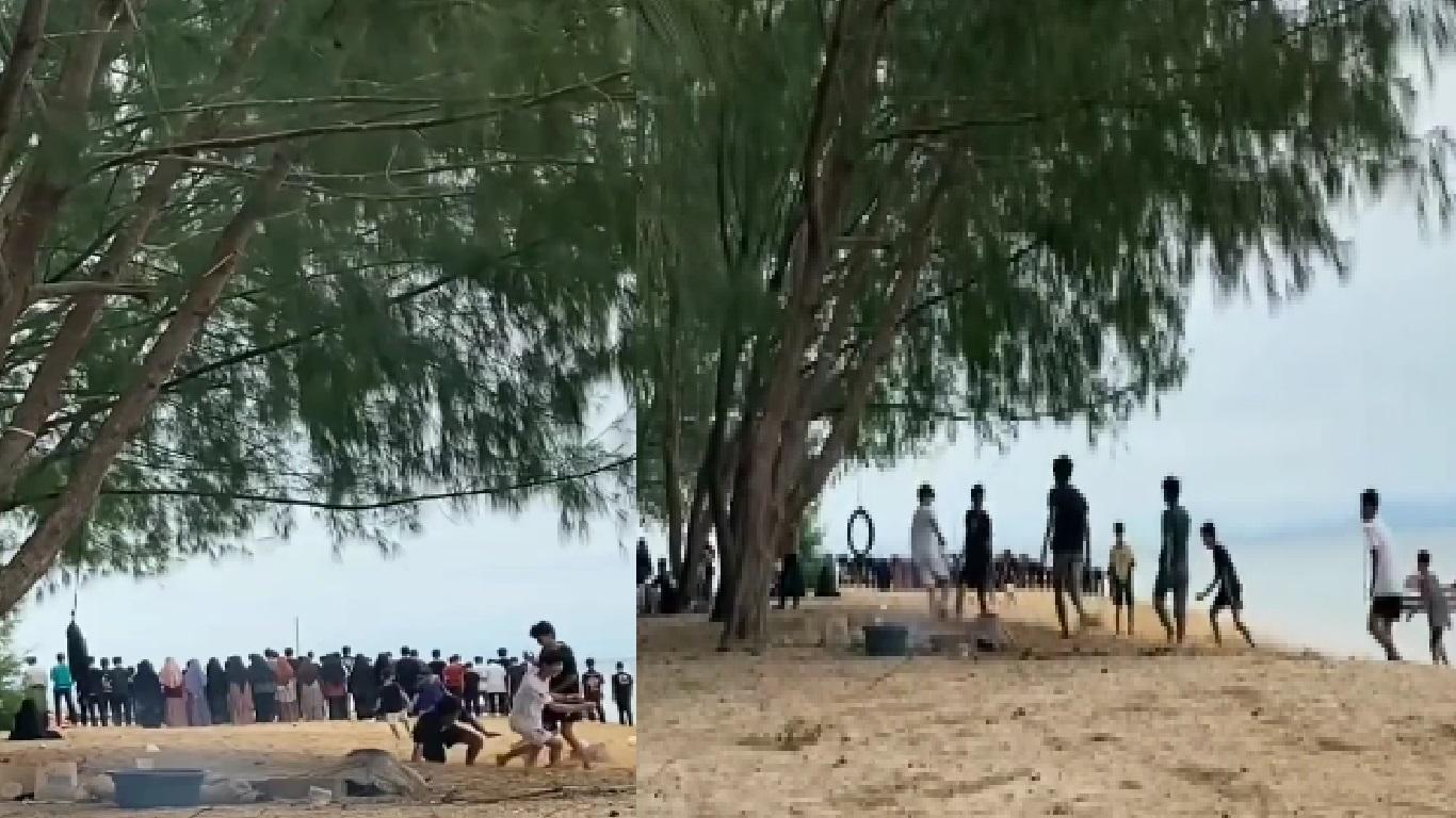 pengunjung-pantai-Toronipa-sedang-shalat-berjamaah-di-pinggir-laut.jpg