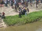 Aparat-kepolisian-dan-warga-mengangkat-kakek-yang-tewas-tenggelam-di-sungai-di-Kolaka.jpg