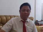 Kepala-SMAN-1-Baubau-Muhammad-Radi.jpg