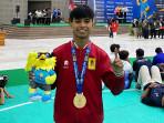 Sosok-Yasir-Mahasiswa-UHO-Kendari-Raih-Medali-Emas-Pencak-Silat-di-Pomnas-2025-Jawa-Tengah.jpg