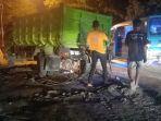 Truk-Pengangkut-Pasir-Terbalik-usai-Tabrakan-dengan-Mobil-Toyota-Rush-di-Puuwatu-Kendari-Sultra.jpg