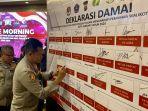 Wujudkan-Pilkada-aman-serta-Konudusif-Polresta-Kendari-Gelar-pilkada-Damai-Kotak-Masuk.jpg