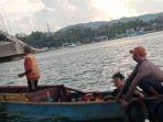 bocah-jatuh-di-jembatan-teluk-kendari.jpg