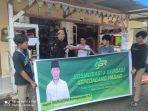 tim-relawan-aku-sahabat-rakyat-asr-roadshow-ke-pasar-sentral-lacaria.jpg