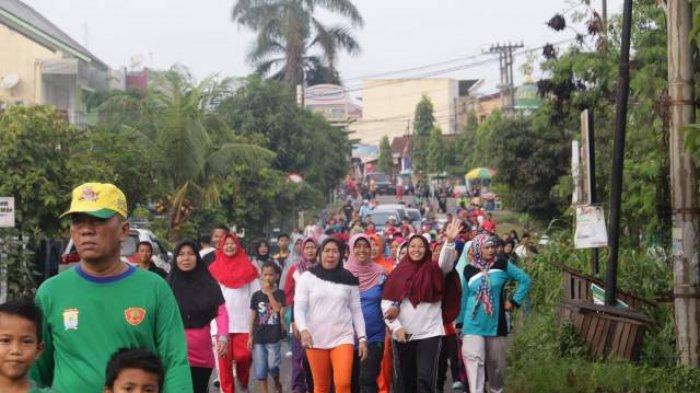 600 Warga Ikut Jalan Sehat Kopi Kapal Api bersama Tribun Sripo di Talang Kelapa