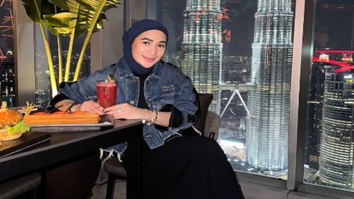 ERIN MUNCUL - Rien Wartia Trigina alias Erin akhirnya muncul buka suara usai beredar isu gugatan yang dilayangkan Andre Taulany.