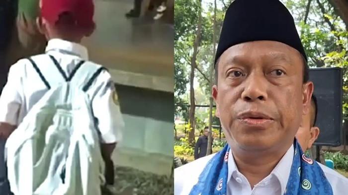 KISAH HAFITHAR - Wali Kota Jakarta Timur, Munjirin (kanan) terharu melihat semangat siswa SD bernama Hafithar (8) berangkat ke sekolah di Klender dari Tangerang sendirian. Ini sosok Wali Kota Jakarta Timur.