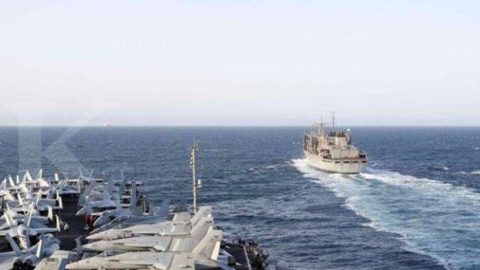 Ilustrasi kapal perang Amerika dan Iran