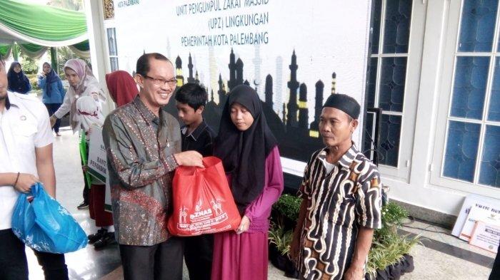 Baznas Bagikan 1600 Paket Lebaran kepada Masyarakat Palembang