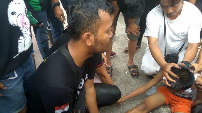 Breaking News: Driver Ojol Selamatkan Dua Bocah Tenggelam di Sungai Jalan Radial, Aksi Dramatis