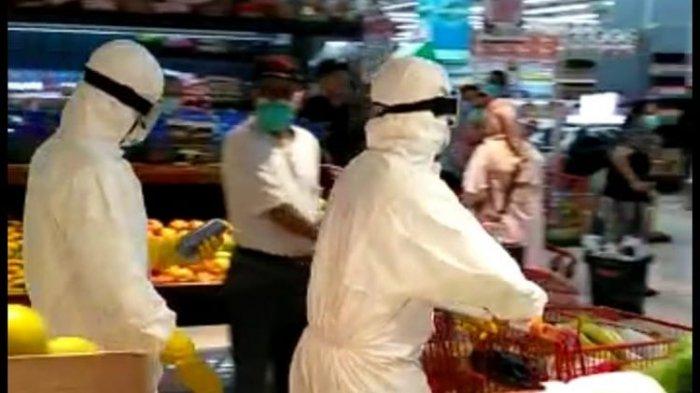 Polisi Akui Pasutri Pakai Hazmat APD yang Viral Saat Belanja di Mal Gancit Takut Terinfeksi Corona