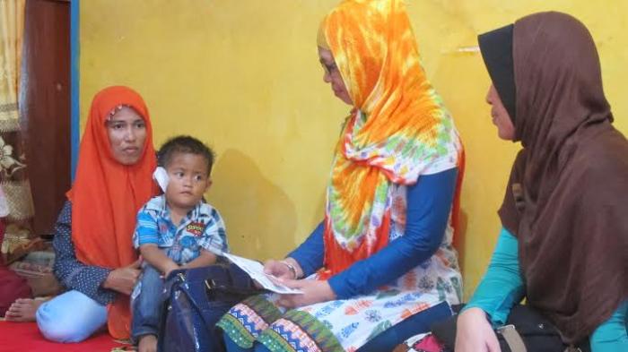 Tribun-Sripo Sampaikan Bantuan 'Peduli Rahmadani'